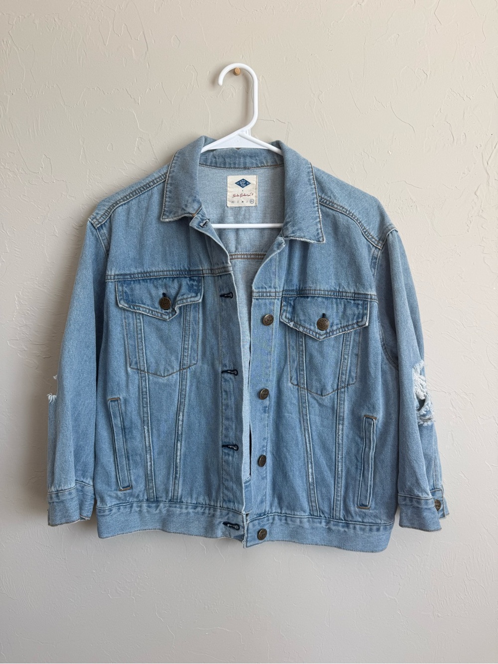 Light Wash Denim Jacket with distressed details